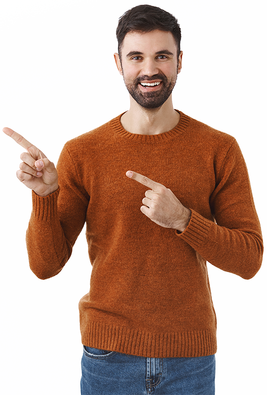 handsome bearded man in sweatshirt pointing fingers left at copy space blank smiling pleased advice buy subscription click link or follow page to find out info white wall